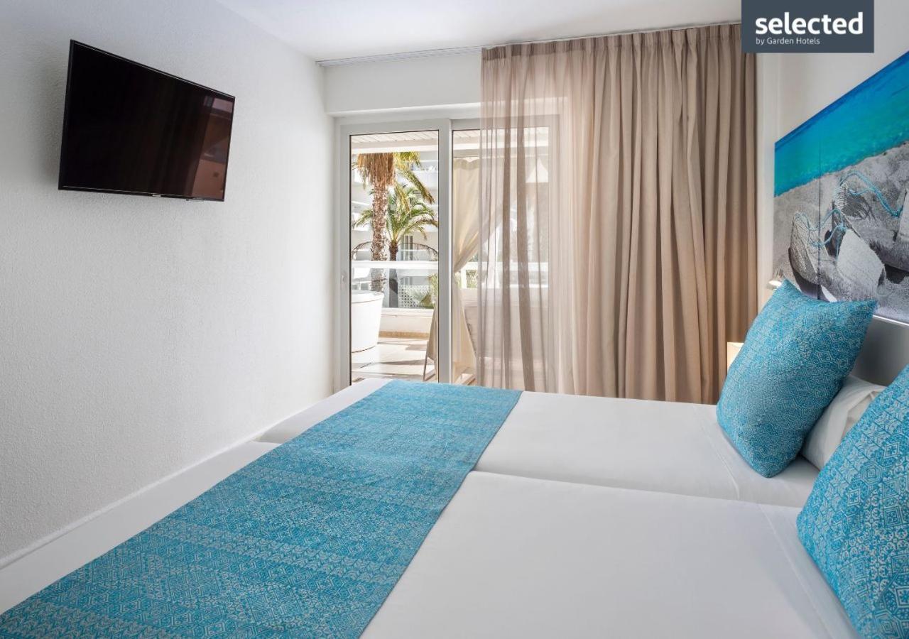 Aparthotel Tropic Garden Santa Eularia des Riu Exterior photo